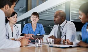 A group of physicians going over the results from a clinical trial of retatrutide testing.