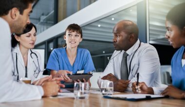 A group of physicians going over the results from a clinical trial of retatrutide testing.