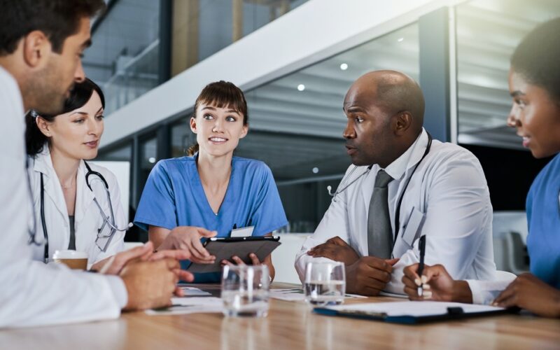 A group of physicians going over the results from a clinical trial of retatrutide testing.