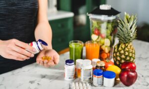 A person mixing supplements with their sermorelin after learning of the benefits.