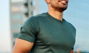 A healthy men going on a jog after getting their physicial performance back through TRT while being aware of how it affects their fertility.