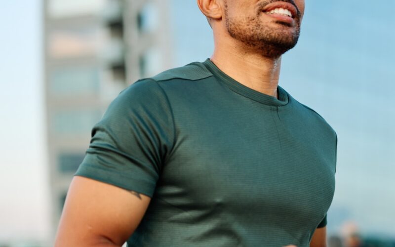 A healthy men going on a jog after getting their physicial performance back through TRT while being aware of how it affects their fertility.