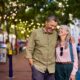 An older couple walking after boosting their metabolism through NAD+ therapy and medication.