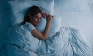 After using B12 injections, a comfortable woman sleeps better and wakes up feeling more rested and energized.